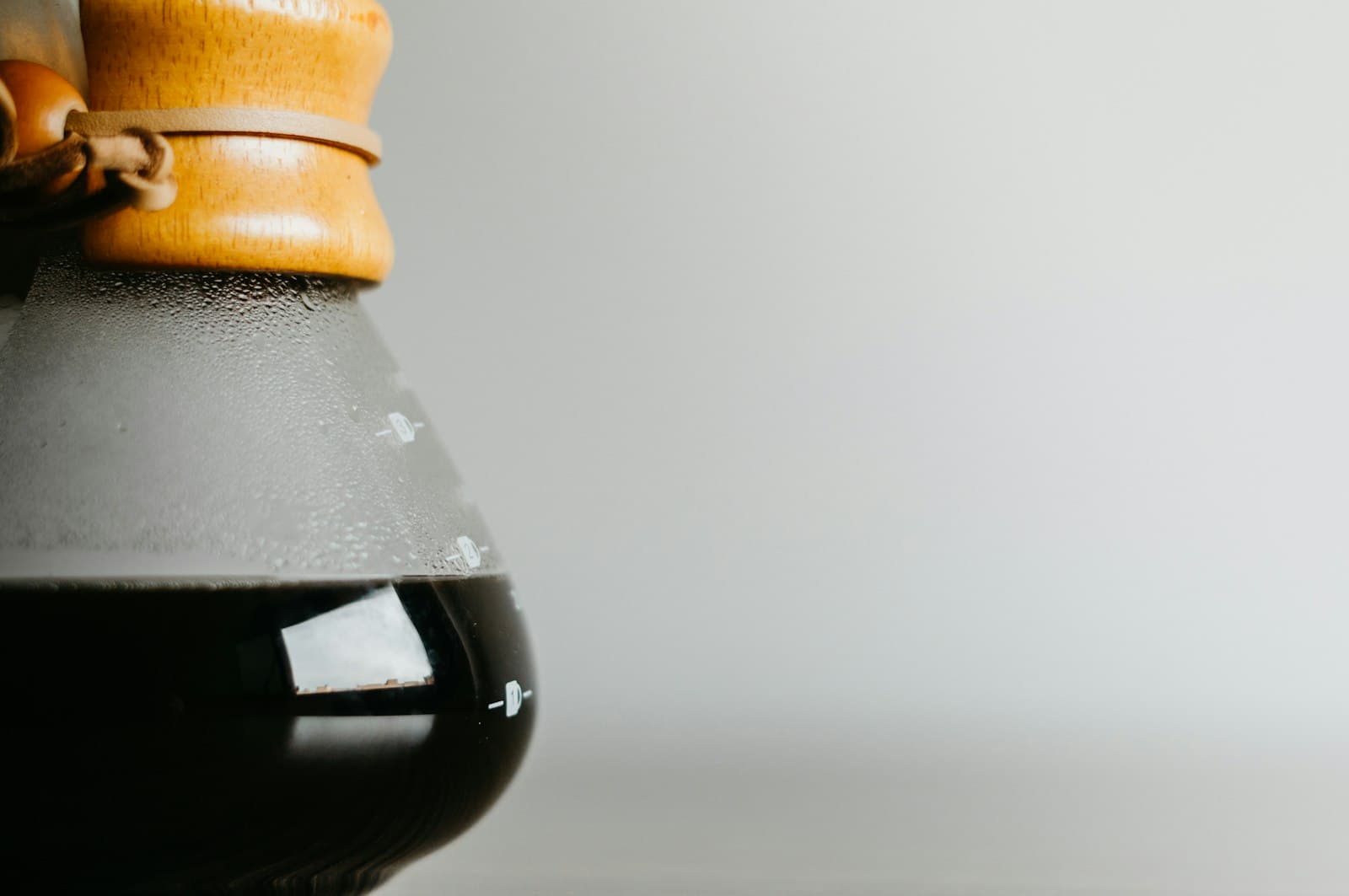 A glass coffee carafe on a table