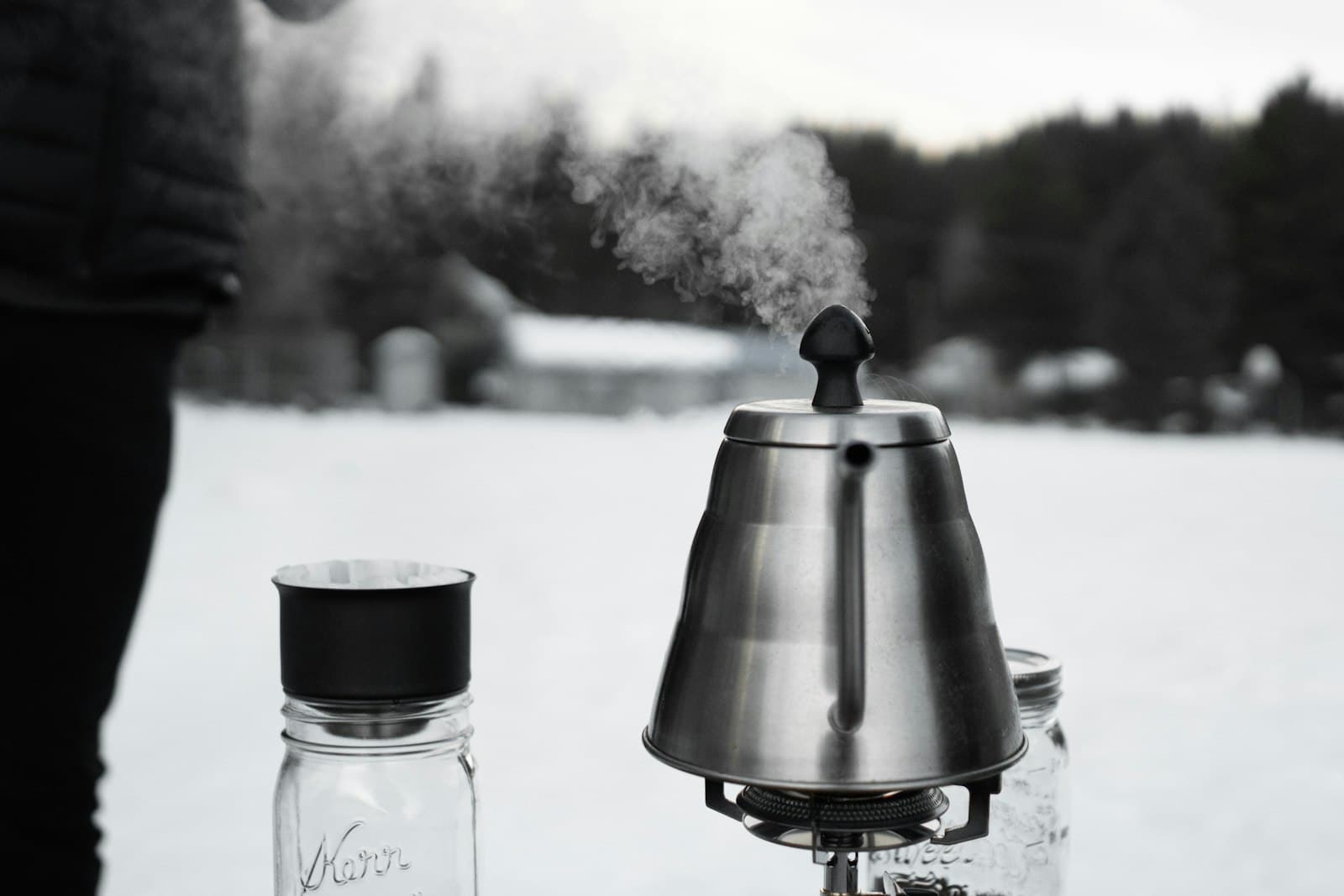 Steam rising from a kettle at brewing temperature